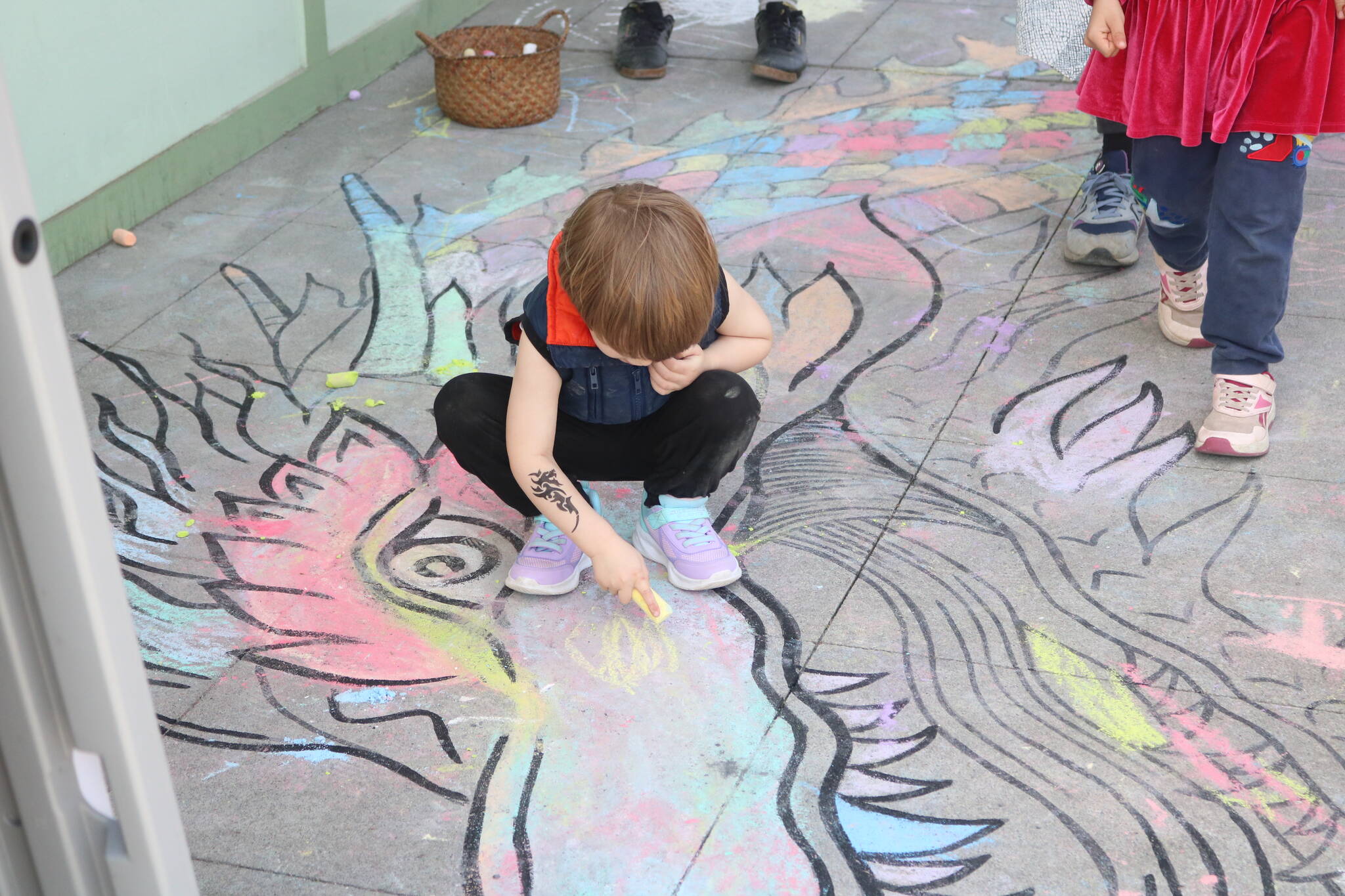 Dragon chalk drawings were one of the many activities at this year’s Dragon Landing celebration. Photo by Bailey Jo Josie/Sound Publishing