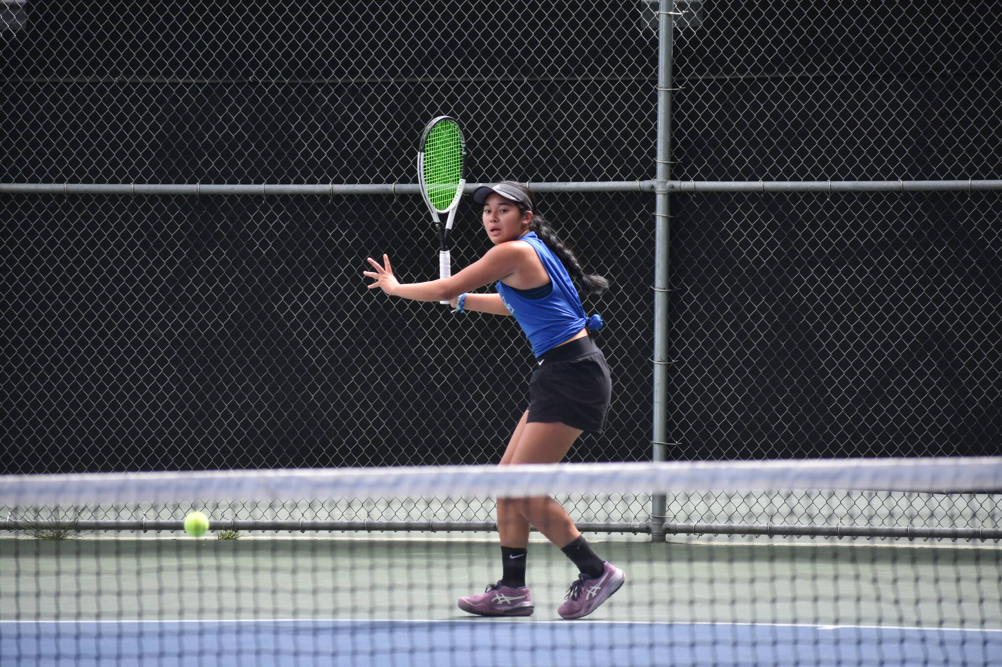 Liberty sophomore Tayler Conway prepares for a forehand shot. Ben Ray / The Reporter
