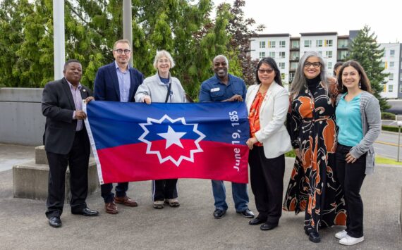 Renton City Councilmember Ed Prince, Mayor Armando Pavone, Councilmembers Valerie O'Halloran, Kim-Khánh Văn, Ruth Pérez and Carmen Rivera hold up the Juneteenth flag at the city's inaugural Juneteenth flag raising on Wednesday, June 18. Courtesy photo.